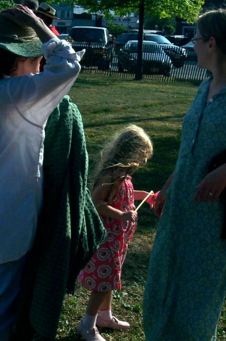 Girl And Pinwheel In Summer